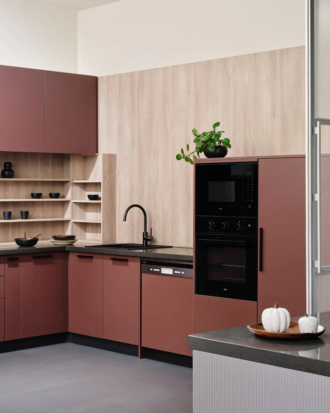 D'Designer's Urban Edge Kitchen: a blend of minimalist elegance and modern convenience. Ergonomically designed with built-in appliances and a textured pattern.